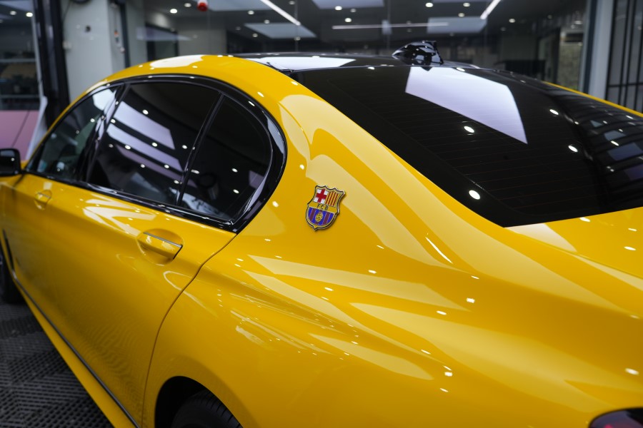 宝马740改色TPU葵花黄